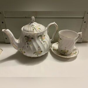 Harrods fine bone china teapot AND 1 teacup/ saucer with a floral pattern